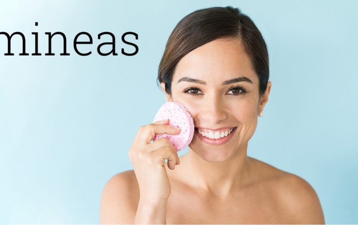 Mineas-woman-cleaning-face-with-sponge.